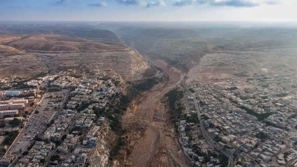 When the dams failed, a vast torrent of water cascaded down the broad valley of the Derna riverbed. WALEED AL-TALIB
